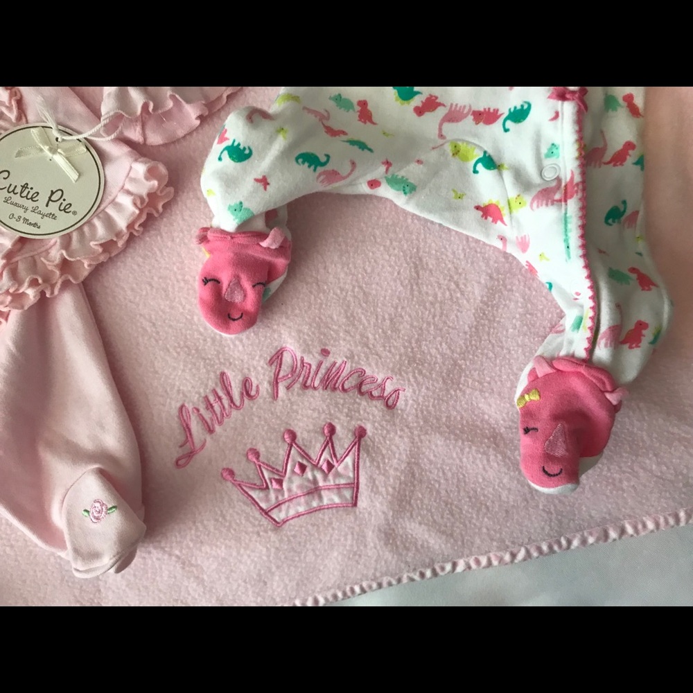 Newborn layette set onesies and blanket